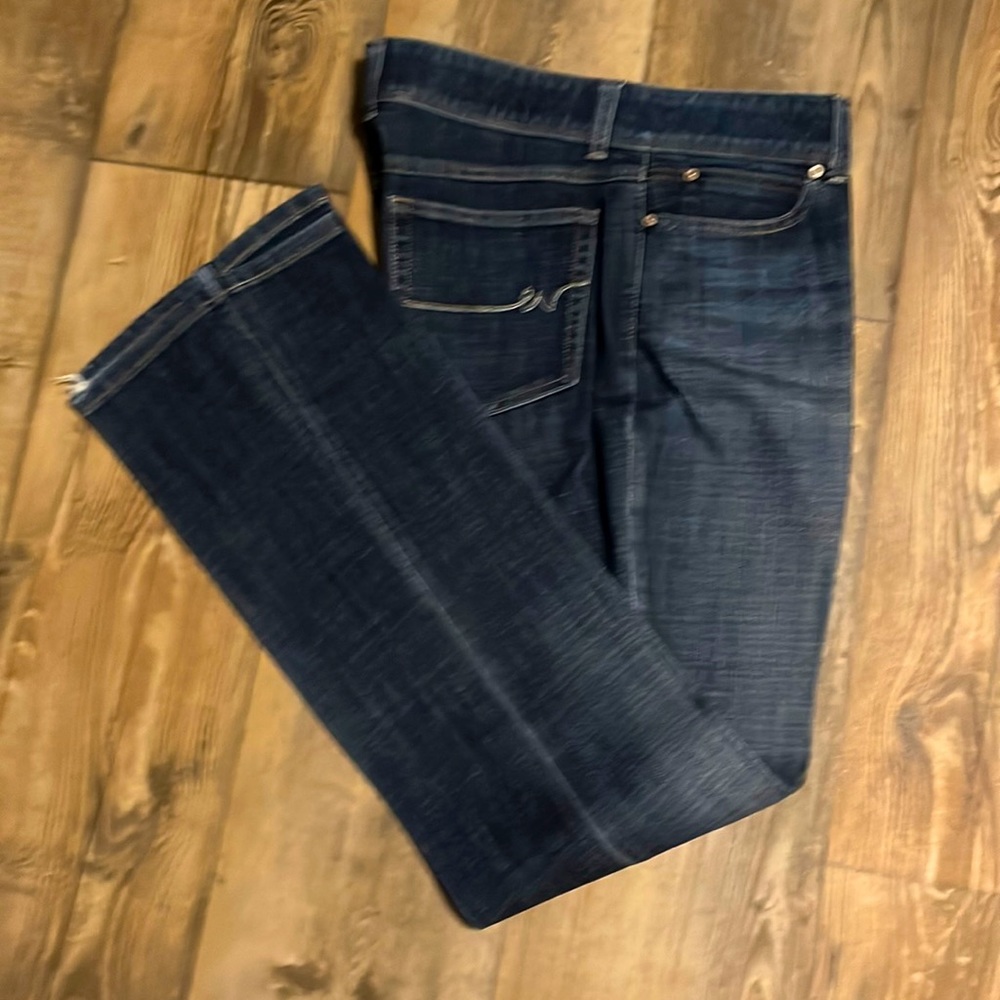 Wrangler Boot Cut, size 12, 32” inseam. Wear at legs hem.